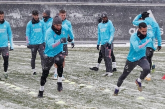 Real Madrid train under the snow