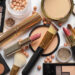 تفاصيل عملية إفشال ترويج مستحضرات تجميل ومواد شبه طبية مزورة وفاسدة 6 Different luxury makeup products on white background, top view