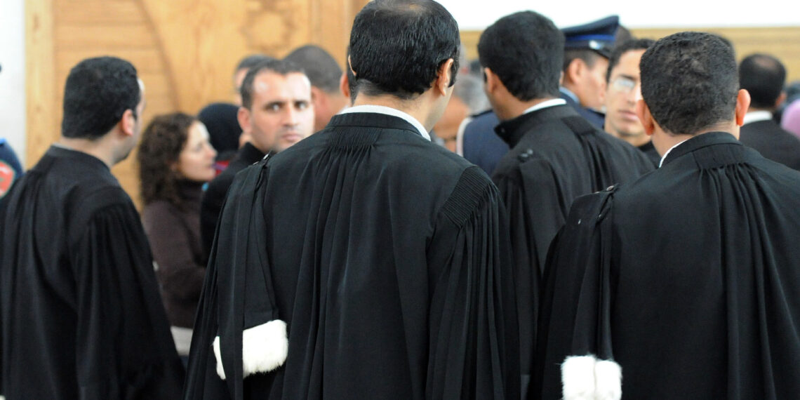 المحامون يواصلون التوقف الشامل ويصعدون الاحتجاج 1 Lawyers are pictured at court in Casablanca on January 28, 2011 after the court postponed the verdict to February 11, 2011, in the trial of seven Sahrawi militants. The militants were arrested in October of 2009 at the airport in Casablanca on their return from Tindouf, in southern Algeria, where there is a strong pro-independence movement 'le Polisario' for the Western Sahara. The Polisario Front, with the support of Algiers, wants a referendum on self-determination, with independence as one of the options. AFP PHOTO / ABDELHAK SENNA (Photo credit should read ABDELHAK SENNA/AFP/Getty Images)