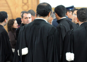 المحامون يواصلون التوقف الشامل ويصعدون الاحتجاج 3 Lawyers are pictured at court in Casablanca on January 28, 2011 after the court postponed the verdict to February 11, 2011, in the trial of seven Sahrawi militants. The militants were arrested in October of 2009 at the airport in Casablanca on their return from Tindouf, in southern Algeria, where there is a strong pro-independence movement 'le Polisario' for the Western Sahara. The Polisario Front, with the support of Algiers, wants a referendum on self-determination, with independence as one of the options. AFP PHOTO / ABDELHAK SENNA (Photo credit should read ABDELHAK SENNA/AFP/Getty Images)